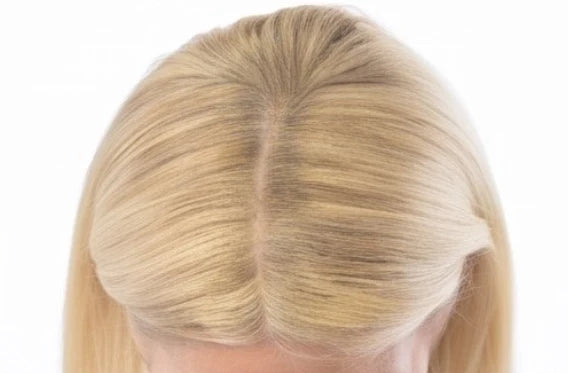 The same blonde part after the cover-up